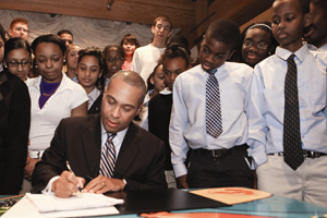 Governor Patrick signing ed reform legislation photo